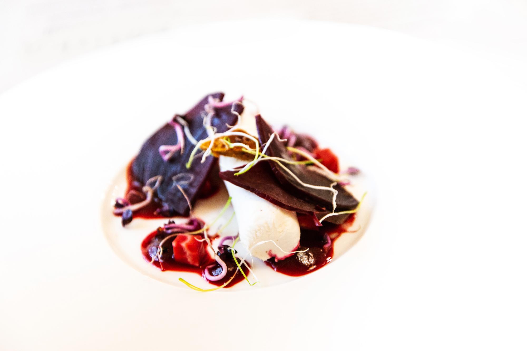 Closeup of plated appetizer with modern garnish
